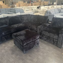 Comfy Black Sectional W/ Console And Ottoman