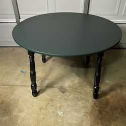 Gorgeous Dark Green Kitchen Or Nook Table  With Black Shinney Legs 