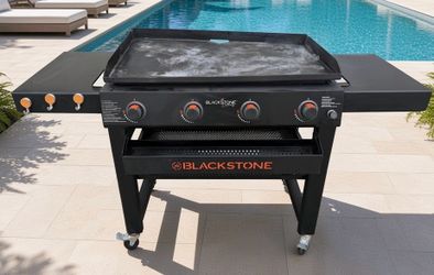 Delivery Available! Blackstone 36-inch Culinary Omnivore Griddle Propane Grill! Great condition! The griddle top is a little crooked see pics but Work