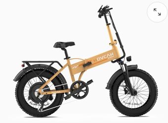 Movcan   Q20   Folding   Electric   Bike 1000W motor folding e-bike with 52V battery, up to 30MPH speed & 40-mile range. NFC display & fat tires.