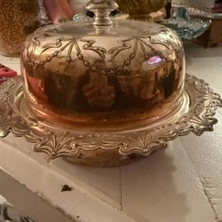 This is a vintage silver-plated butter/cheese dish with a domed lid.
