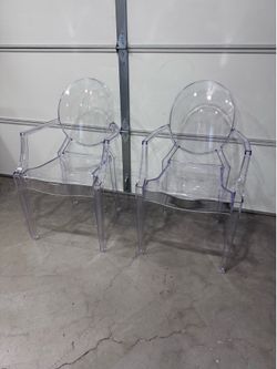 Pair of Ghost Chairs. 2 chairs.
