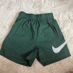 Green Nike shorts
