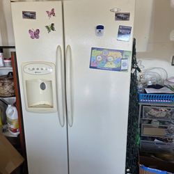 Side by side Maytag refrigerator