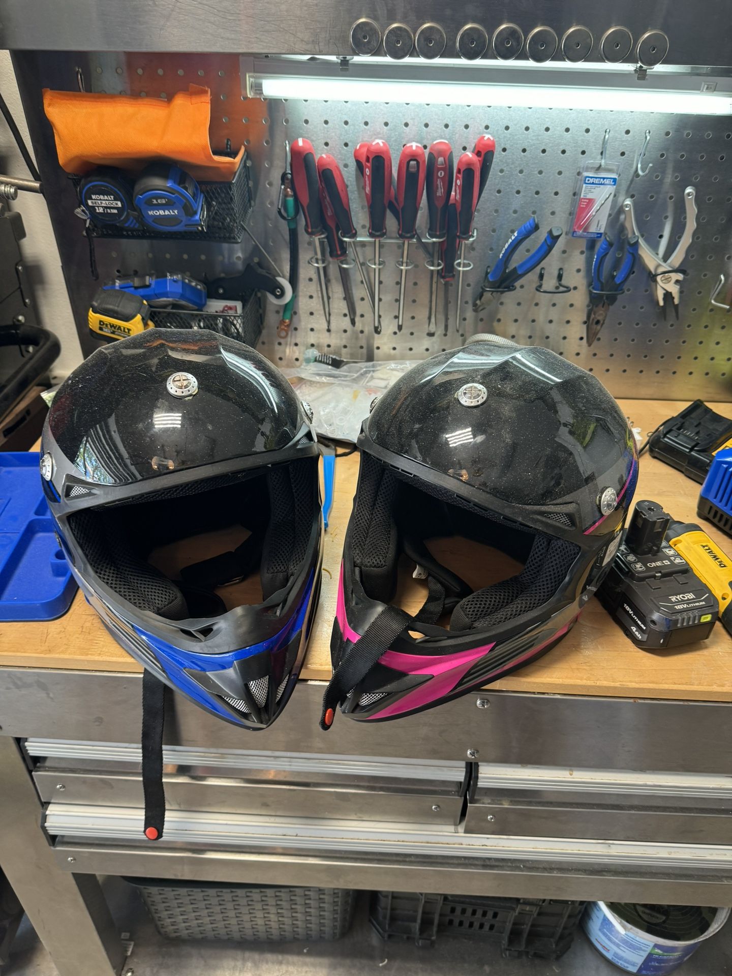 Two kids riding helmets, one small one extra small must take both