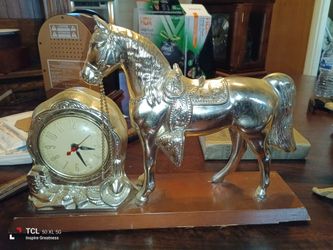 Antique mantle clock horse