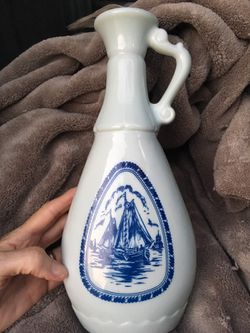 Vintage milk glass bottle sailing ship windmill design