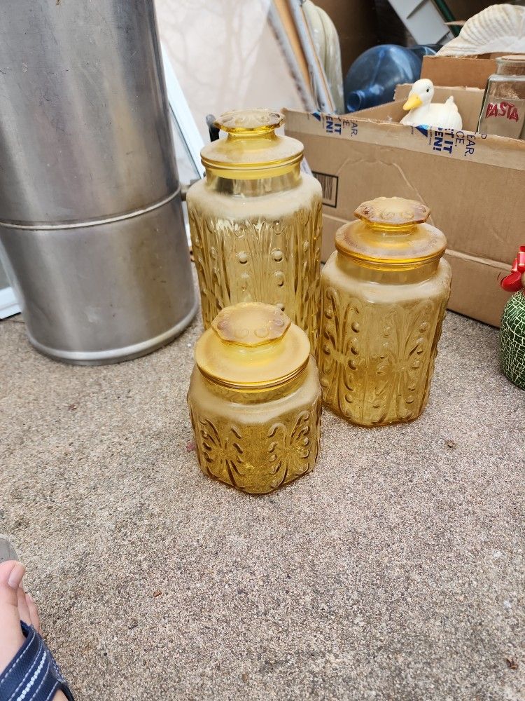 Set of Yellow Glass Containers