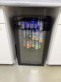 Clear glass mini fridge