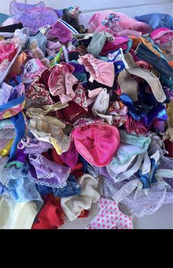 Lot Of Barbies Clothes 