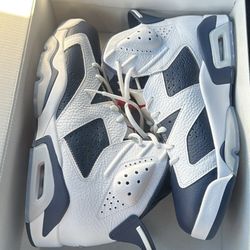 Size 10 men’s Jordan 6 Retro Sneakers white/varsity red
