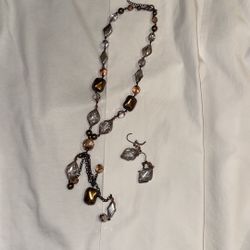 Brown toned necklace and earring set with beads and gems
