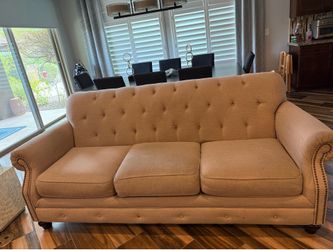 2  beige sofas