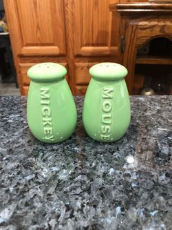 Disney Mickey Mouse Salt Pepper Shakers M.Mouse Dinnerware Collection. Size 3 1/4 inches tall. Color green one shaker had Mickey written on it and