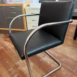 Leather And Stainless Steel Chairs