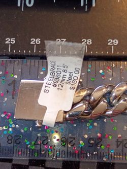Stainless steel bracelet 12mm 8.5 " long with clamp on ends with CZ stones