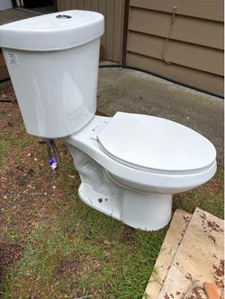 Glacier Bay, dual flush, chair height, elongated bowl
