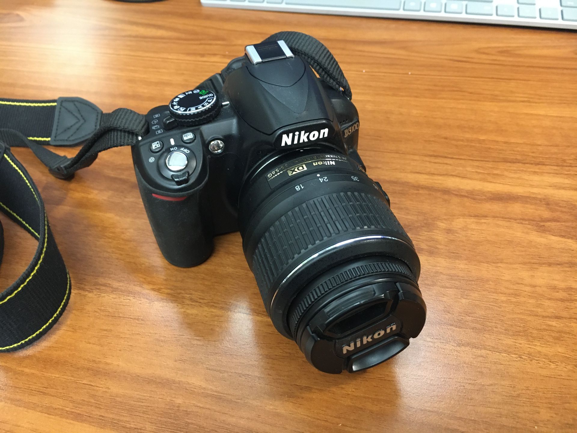 Nikon D3100 Digital Camera with Nikon DX 18-55 Lens and Strap