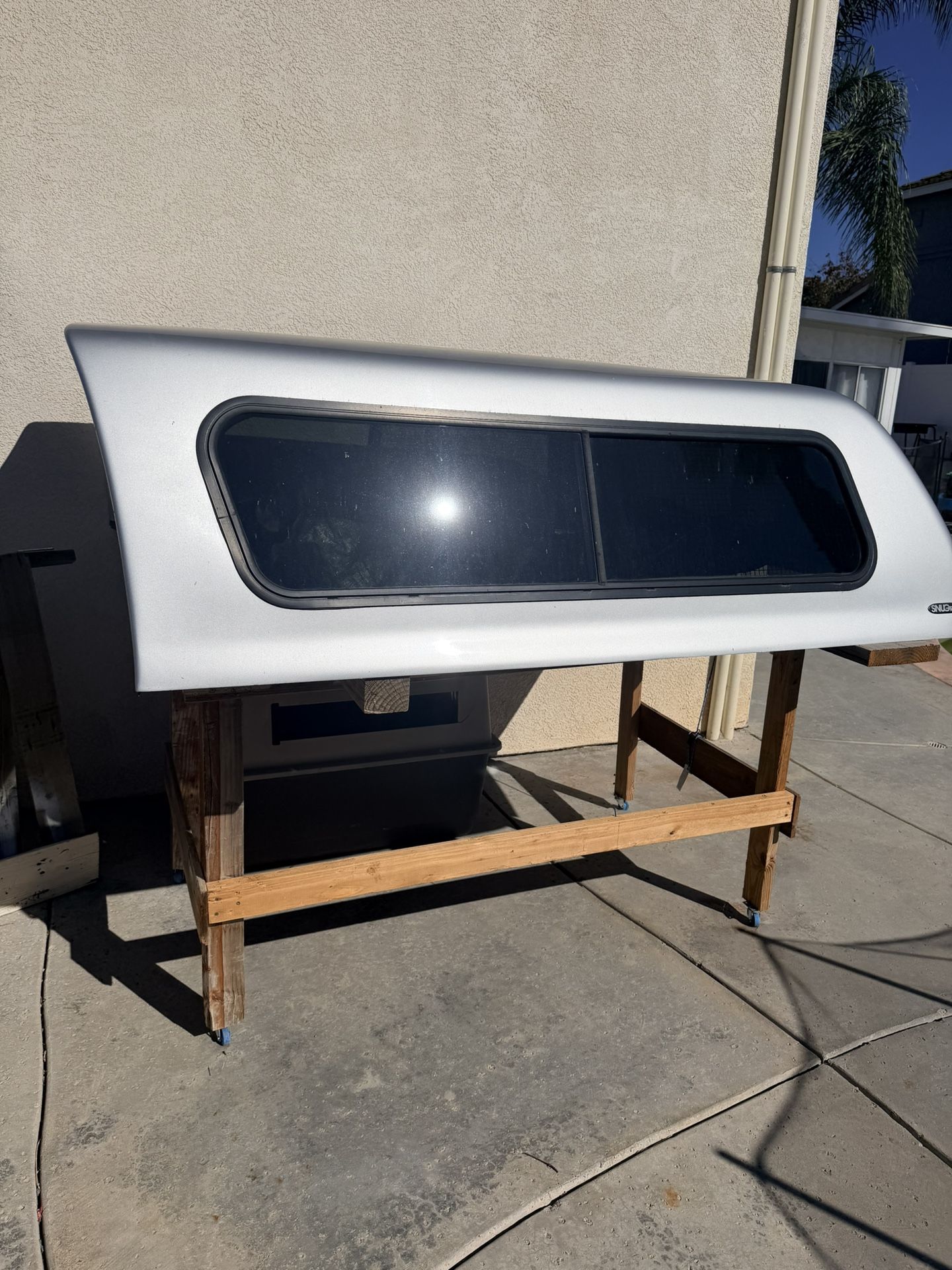 SnugTop Camper Shell – 2015 Ram 1500 6.4’ Bed – Silver – Great Condition