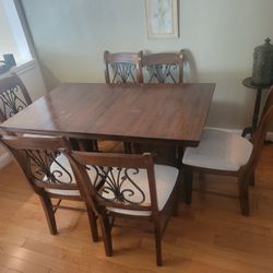 Dining room table and 6 chairs.
