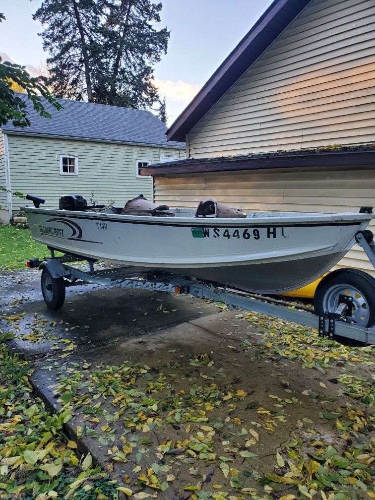 2007 Alumacraft T14V Boat With a 95 Evinrude 9.9 Outboard Motor 