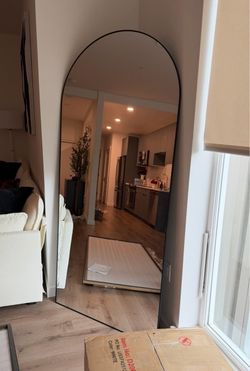 Floor length rounded mirror