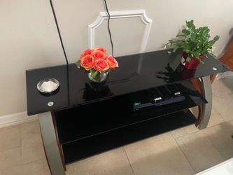 Glass, wood and metal tv console