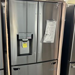 NEW IN BOX LG FRENCH STYLE STAINLESS STEEL REFRIGERATOR