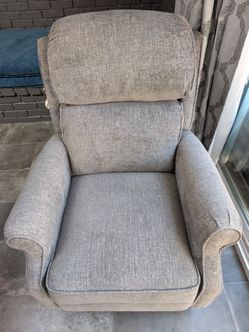 Reclining arm chair