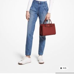 Michael Kors Everly Medium Saffiano Leather Satchel in an oxblood or maroon color.