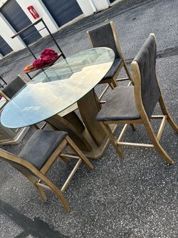 Glass Top Oval Dining Table with 4 Chairs
