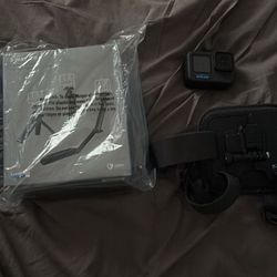 GoPro Hero 12 with new still sealed accessorie (3 Way 2.0) Also comes with a lightly used chest strap