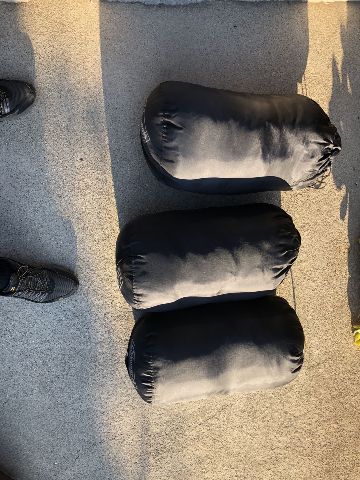 3 Black Coleman Sleeping Bags
