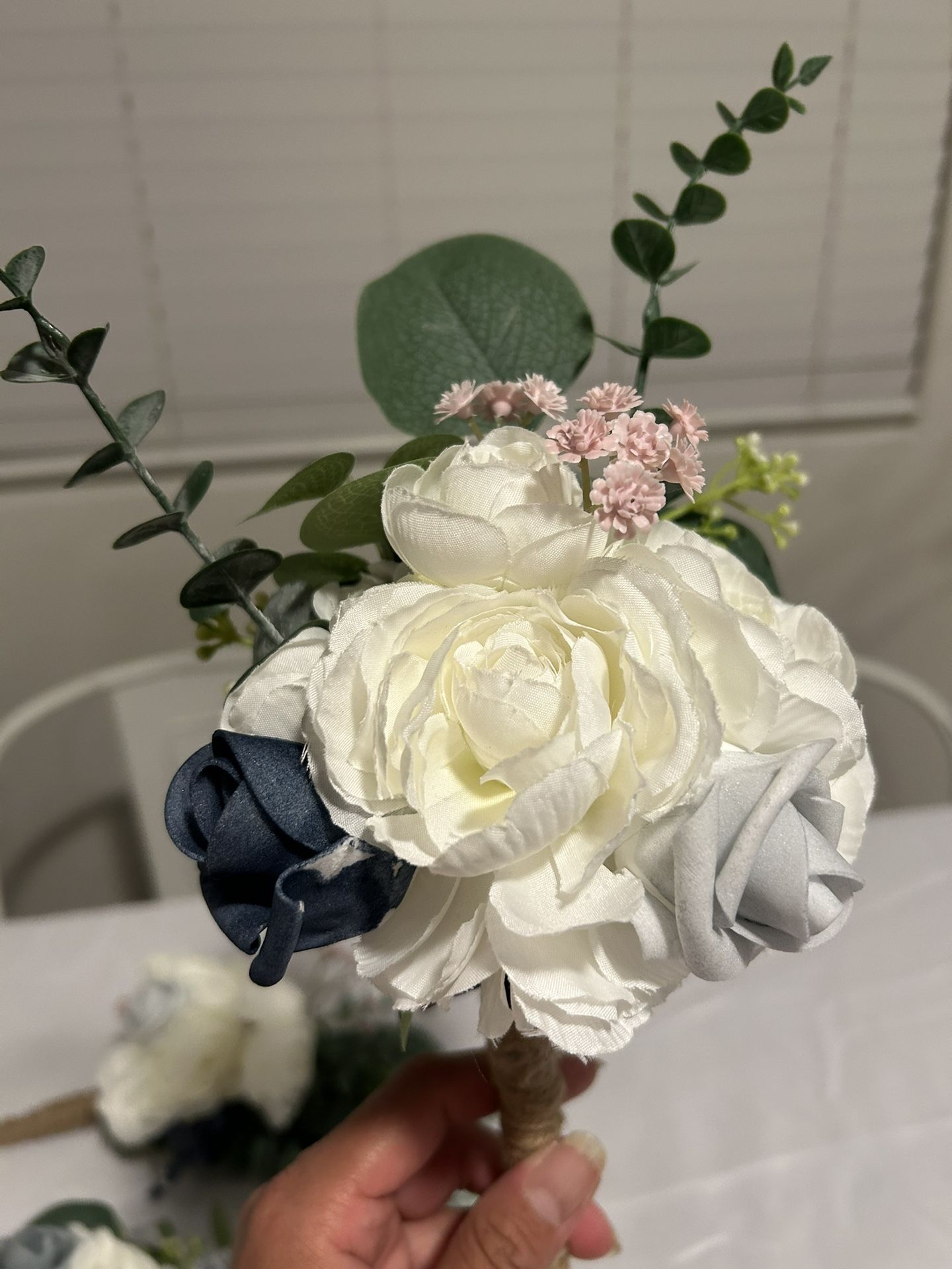 Simple bouquets & White Rose Garlands