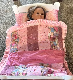 Doll size quilt and pillow (does not come with doll or bed)