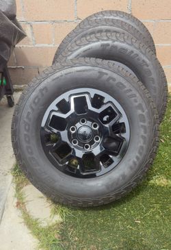 2026 4th Gen Toyota Tacoma black rims and tires