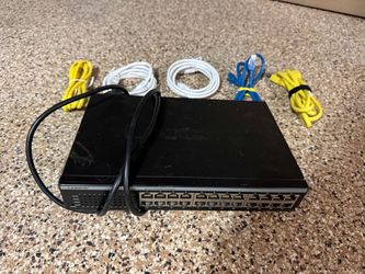 Linksys 24-Port 10/100 Ethernet Network Switch (Model EF4124) w/ 5 Free Cables