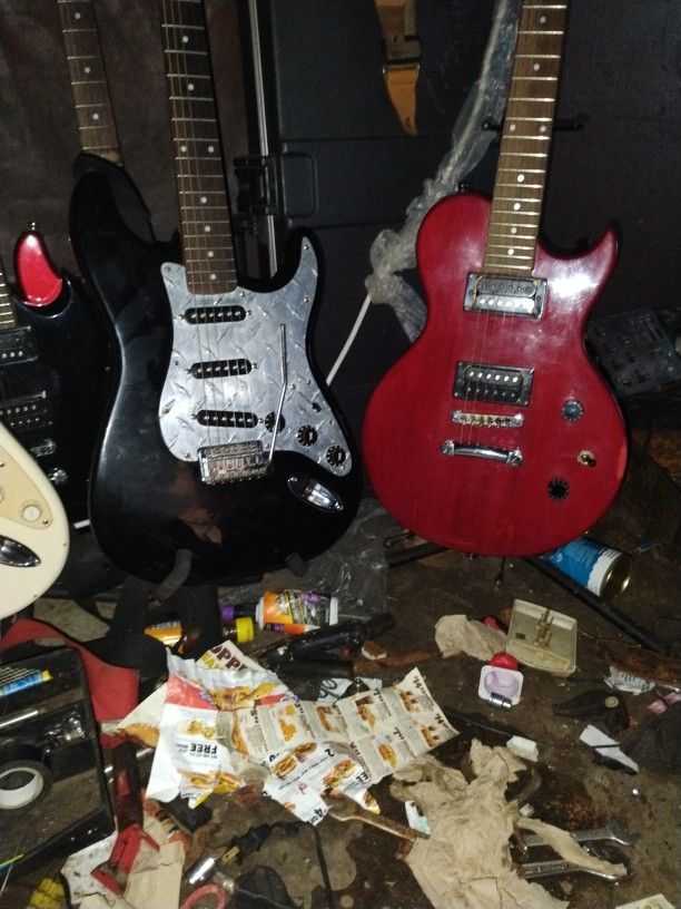 Guitars. SG.  Les Paul.  