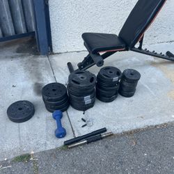 Fitness Bench And Lots Of Weights