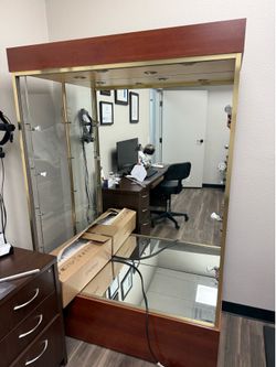 Mirrored display case with lights