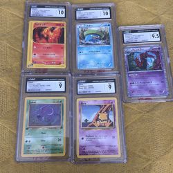 4 1st edition and one base set Pokemon cards graded CGC