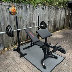 Complete 2” Olympic Style workout set with bench, squats and curl bench. 7’ bar and steel plates totaling 265 lbs. Everything in pics is Included