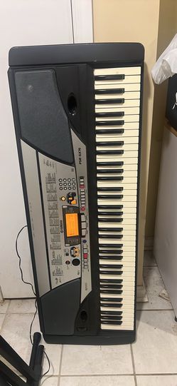 Yamaha PSR – GX76 keyboard with bass boost system . Free stand included