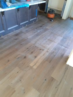 Hardwood glue down..