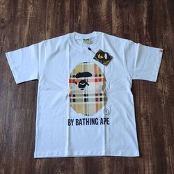 Essentials shorts and Bape shirt