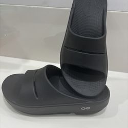 Oofos black slides