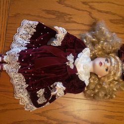 Porcelain Doll In Velvet Dress