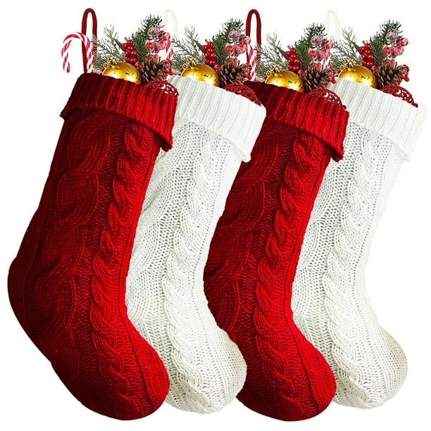 4 pieces of knitted Christmas stockings, knitted stocking decorations in red and white.