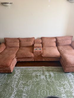 Orange Couch w Charging capabilities