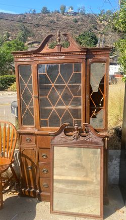 Antique china cabinet and table set with chairs